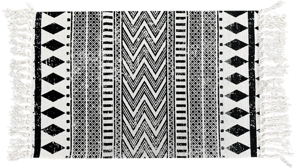 Ink Ikat layering rug, laid flat
