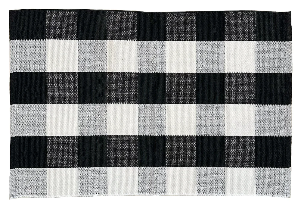Monochrome Check layering rug, laid flat